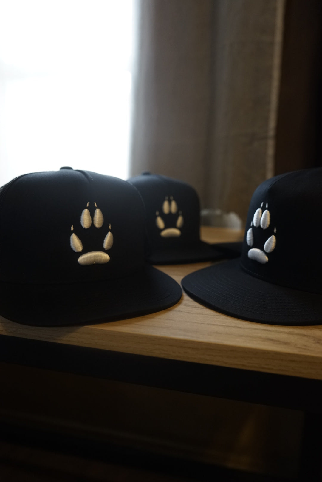 Riley’s Paw Trucker Hat